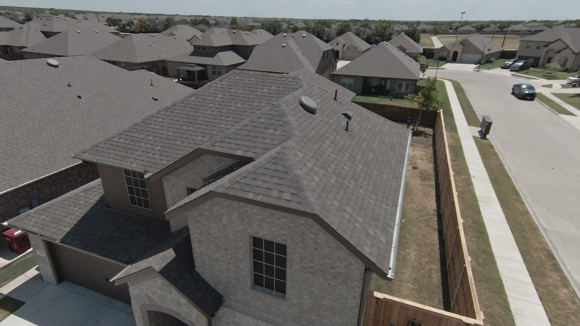 Aerial of new roofs in a Royse City, TX subdivision