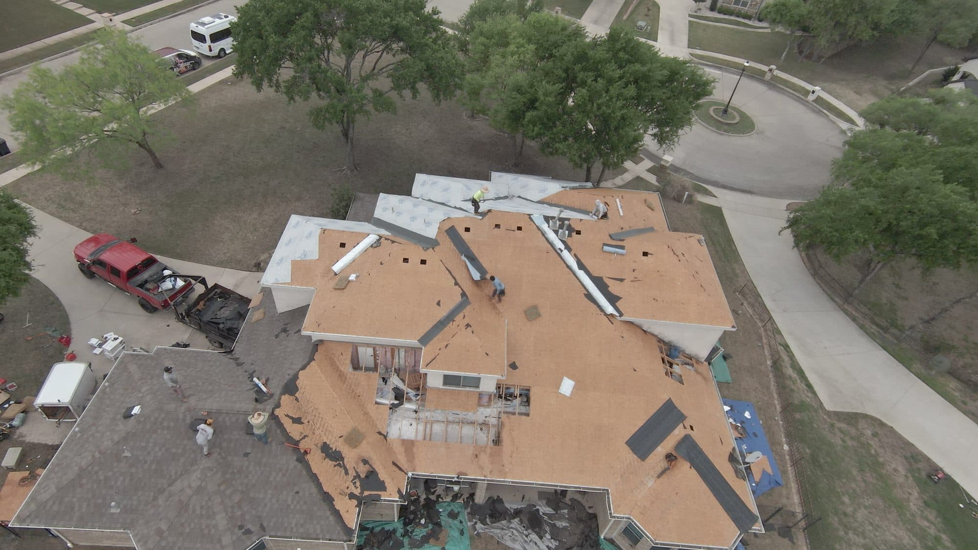 Roof torn off to the decking during a professional replacement in Sunnyvale, TX