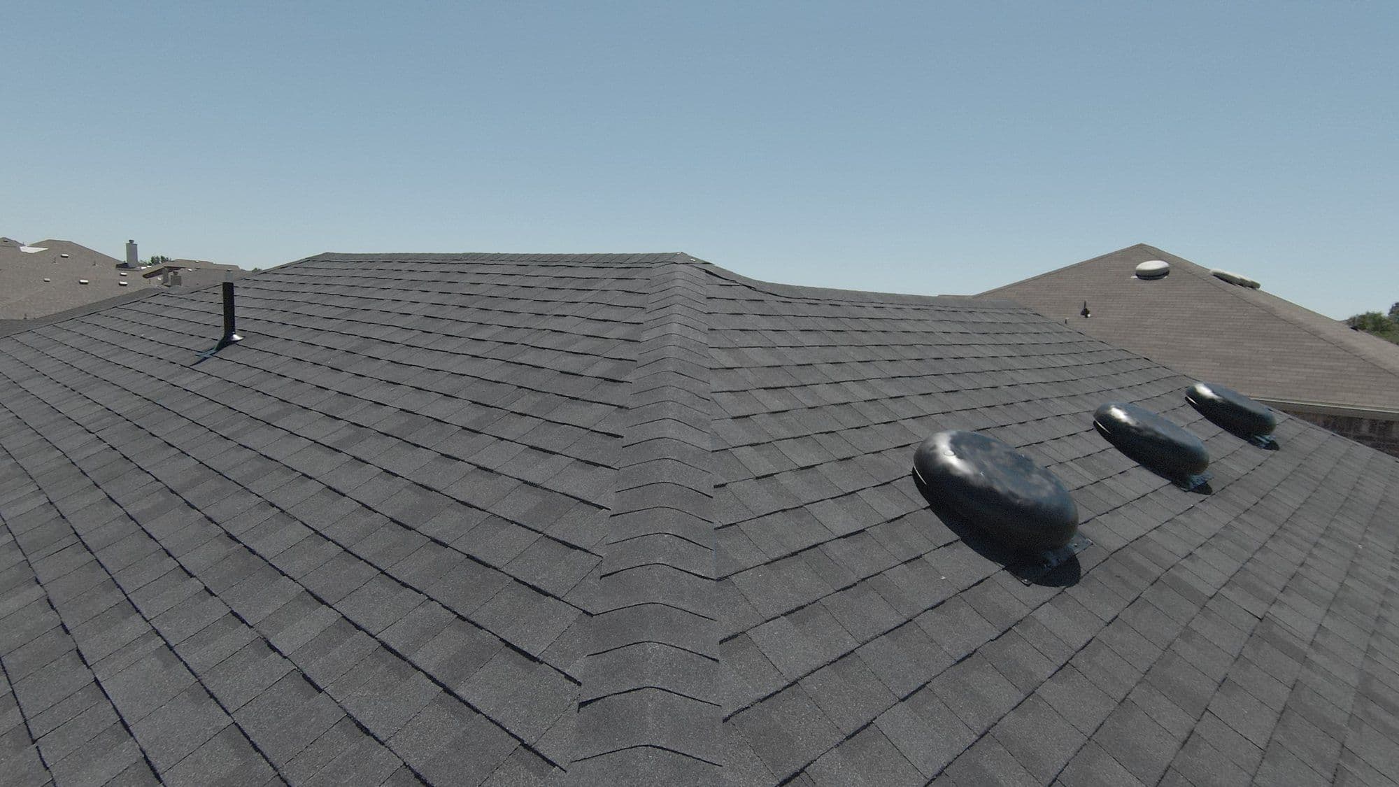 New turbine vents on new charcoal shingles, Forney area